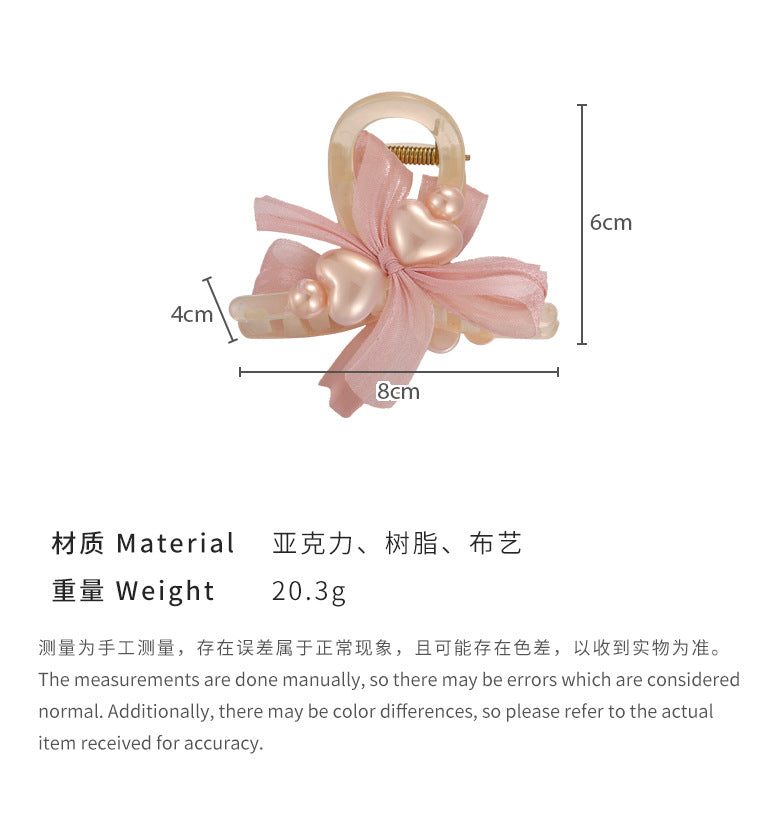 E廠-簡約愛心珍珠抓夾女2024新款高級感蝴蝶結頭飾後腦勺半扎髮鯊魚夾「25564」24.06-2